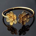 City Girl Brass Gold-plated Floral Cutwork Bracelet