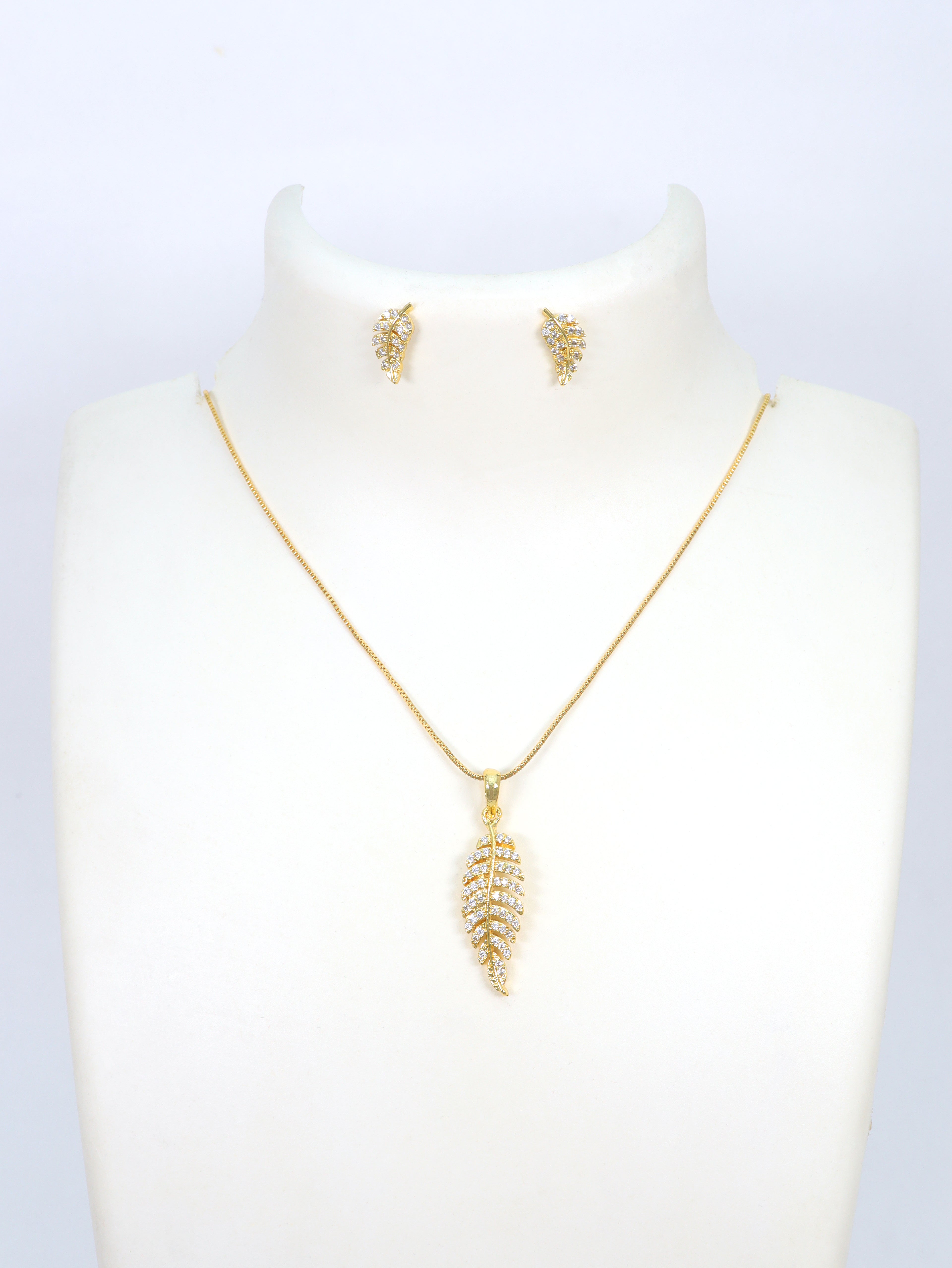 City Girl Cubic Zirconia 24CT Gold Plated Copper Minimalist Leaf Pendant Set With Mathcing Earrings For Women and Girls.(AD LK SET 005)