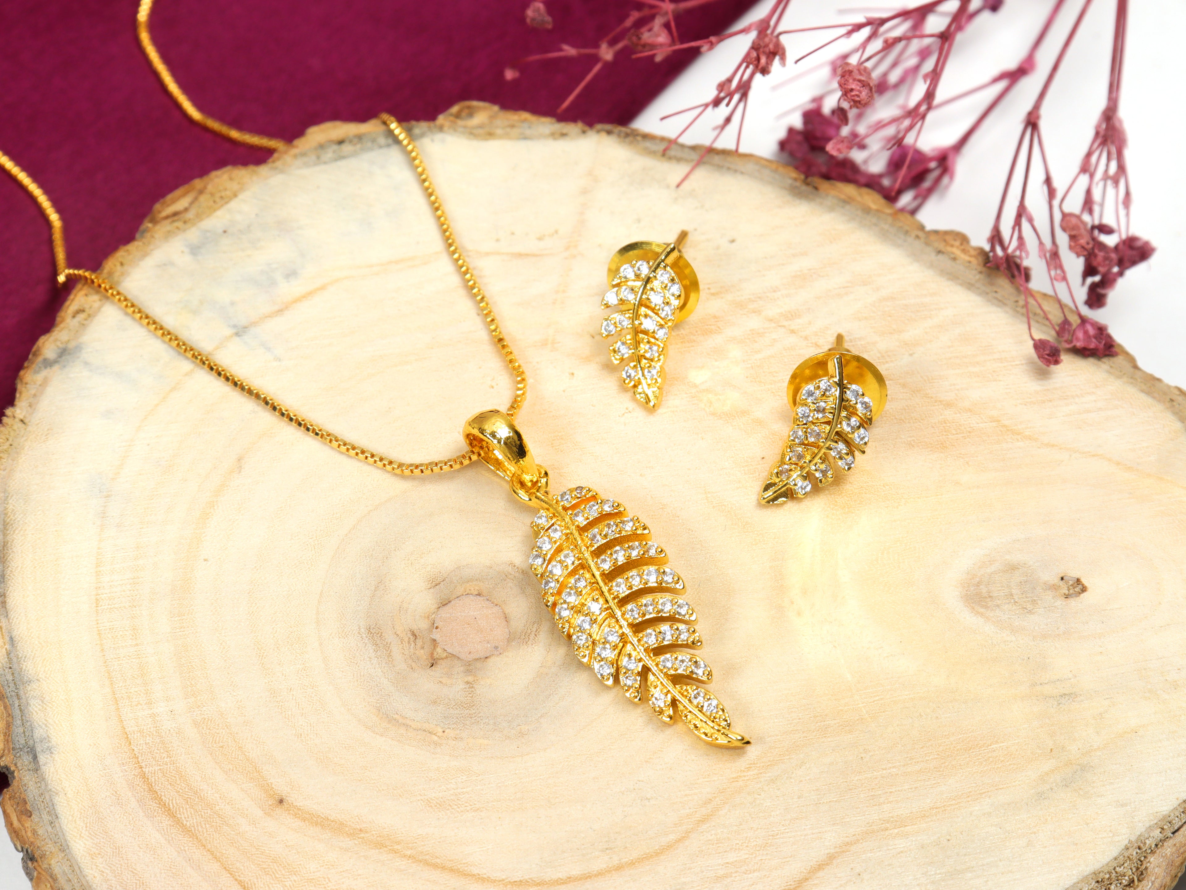 City Girl Cubic Zirconia 24CT Gold Plated Copper Minimalist Leaf Pendant Set With Mathcing Earrings For Women and Girls.(AD LK SET 005)