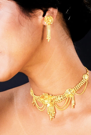 Manikya Golden Brass Bridal Necklace Set – Intricate Carved Design with Matching Earrings